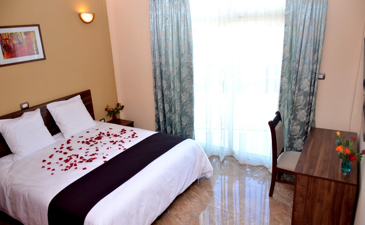Melodie Hotel Addis Ababa Bagian luar foto